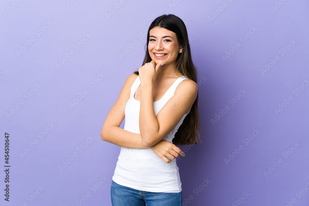 Young brunette woman over isolated purple background happy and smiling Young brunette woman over isolated purple background happy and smiling