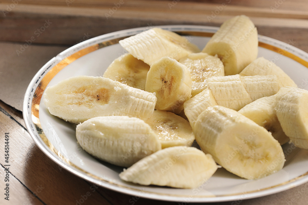 sliced bananas in a plate - close-up sliced bananas in a plate - close-up