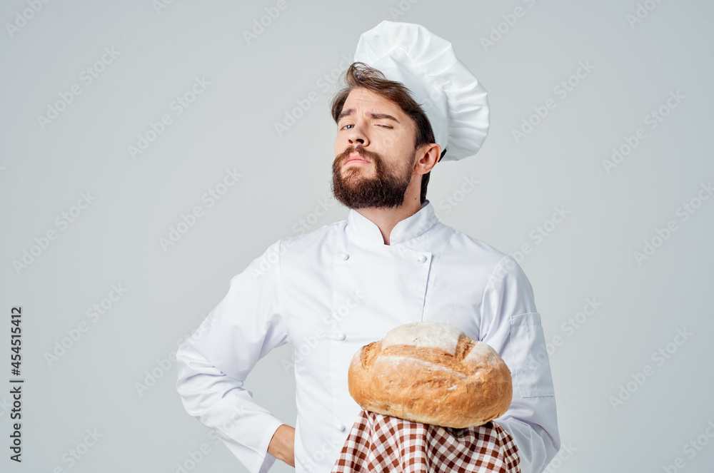 male cook Cooking bakery light background male cook Cooking bakery light background