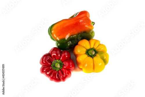 trio of yellow and red peppers