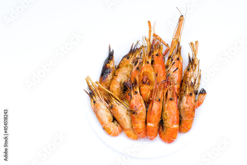 Delicious river prawns burnt on a white background © nut_foto