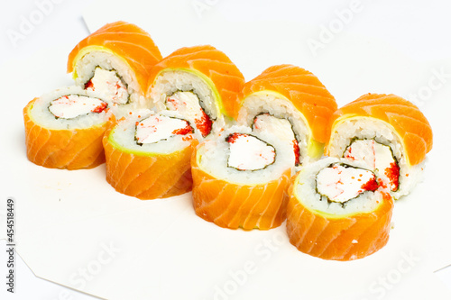 Traditional japanese nigiri sushi, separated on white background, side view