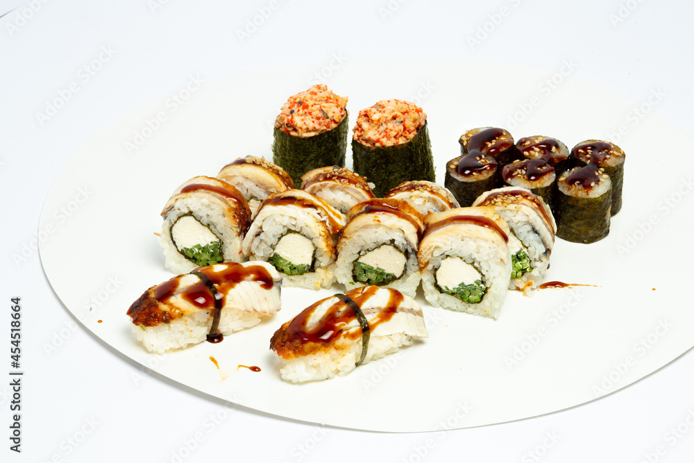 Traditional japanese nigiri sushi, separated on white background, side view