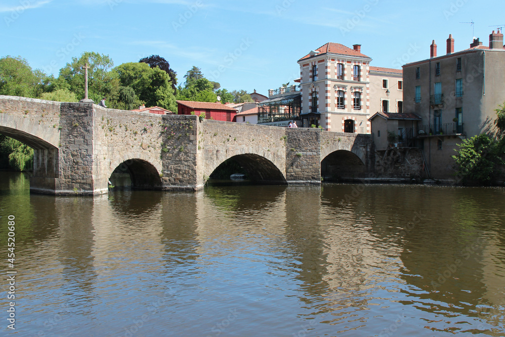 ancient stone bridge and river sevre  in clisson (france) 