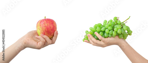 Red apple and green grape mix, fruits isolated on a white background, healthy food in hand photo