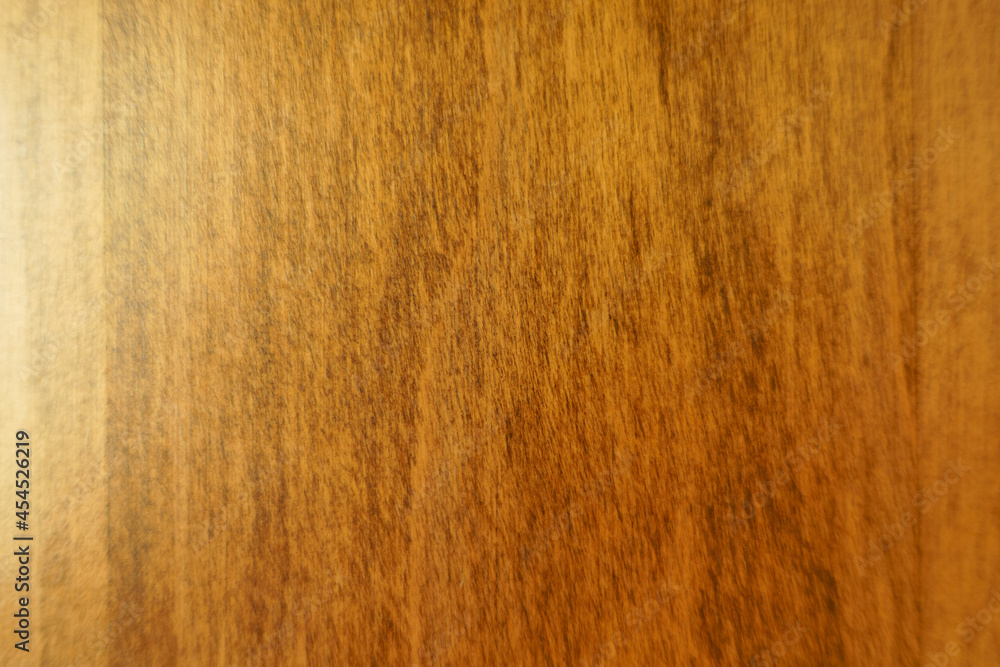 Naklejka premium Texture of simple brown polished wooden plank from above