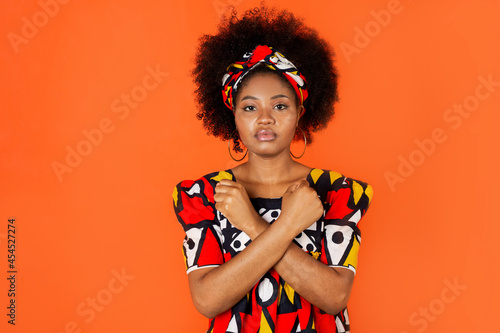 hand gesture protest of beautiful african female in traditional dress 