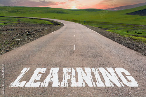 Fotografija Learning written on rural road