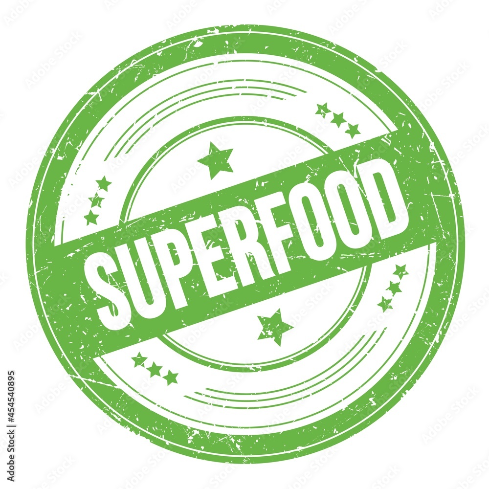 SUPERFOOD text on green round grungy stamp.