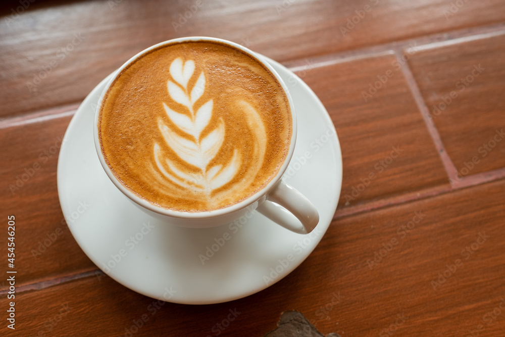 hot coffee cup on table at morning, relax time, latte coffee hot coffee cup on table at morning, relax time, latte coffee
