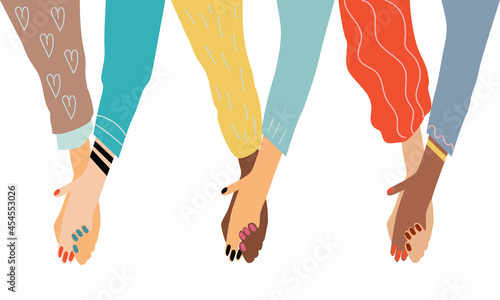 Diverse international group of happy women or girls hands holding hands in support, feminism, friendship, peace and solidarity