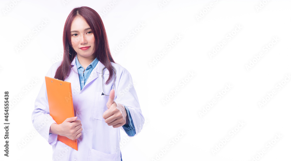 Healthy care and medical concept. Hand of professional young woman doctor wear uniform coat with stethoscope holding clipboard while showing thumb up for good job over isolated white background. Healthy care and medical concept. Hand of professional young woman doctor wear uniform coat with stethoscope holding clipboard while showing thumb up for good job over isolated white background.
