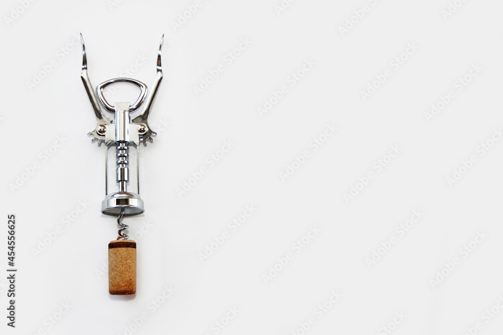 metal corkscrew for opening a wine bottle - obrazy, fototapety, plakaty 