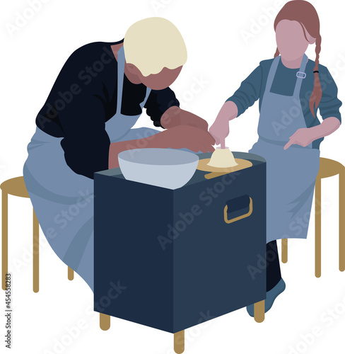 A girl and a man behind a potter's wheel
