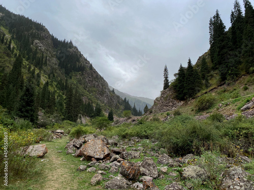 Descent from the Kegety Pass on the northern side of the slope. Kegety River valley. Tien Shan Mountains. Chui region. Kyrgyzstan. photo