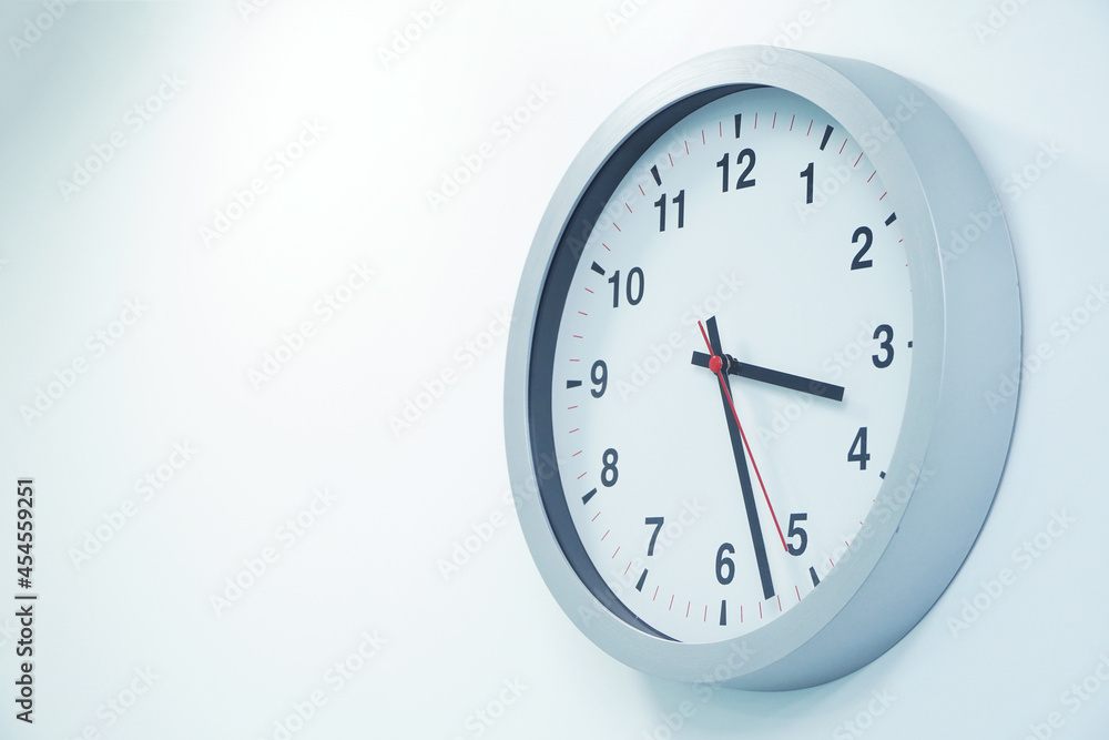 Wall clock, round, gray, three o'clock twenty-seven o'clock. Wall clock, round, gray, three o'clock twenty-seven o'clock.