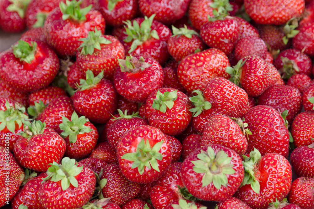 Huge red juicy ripe strawberries at the market in the city, harvest at the dacha. Huge red juicy ripe strawberries at the market in the city, harvest at the dacha.