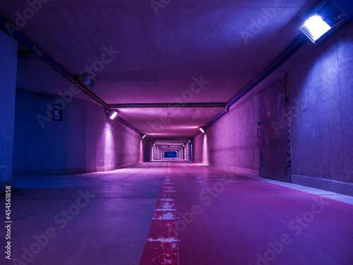 Neon tunnel at night, blue and pink lights