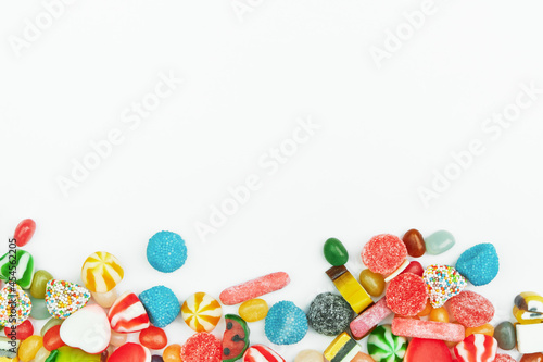 Photography Multi-colored gummy candies on a white background