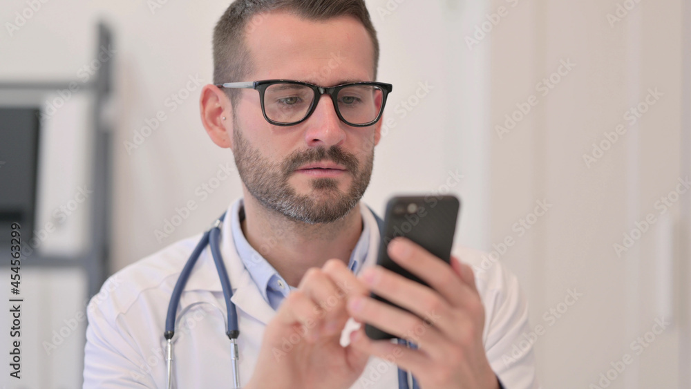 Portrait of Middle Aged Doctor using Smartphone Portrait of Middle Aged Doctor using Smartphone