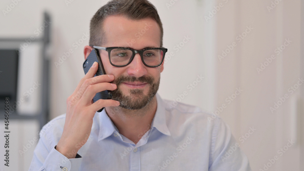 Portrait of Middle Aged Man Talking on Smartphone Portrait of Middle Aged Man Talking on Smartphone