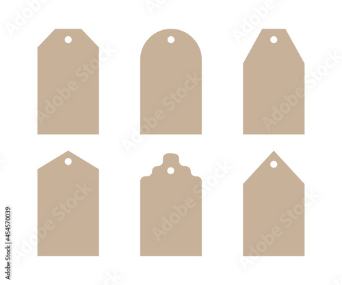 Vector isolated set of Christmas gift tags with various shapes. Template for decoration. Made in craft style from paper or cardboard. Symbol is used in design of discounts, sales in shopping time