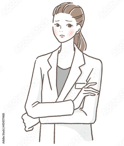 困った顔をする女性の医者