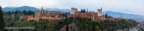 Panoramic view of the famous Alhambra palace at sunset, Granada, Spain © Arkadii Shandarov