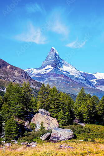 Obraz na płótnie Magical beautiful landscape with fir trees on background Matterhorn in the Swiss Alps, near Zermatt, Switzerland. Amazing places. (Meditation, antistress - concept). w salonie