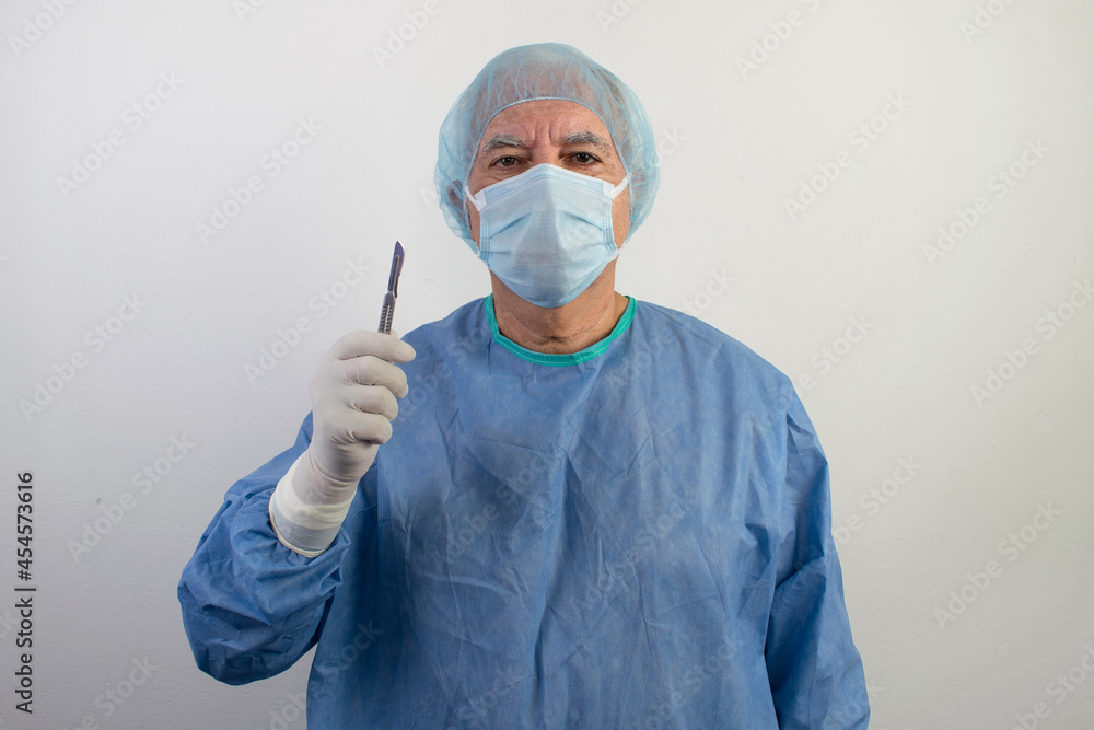 old senior male surgeon uniform doctor hand hold scalpel medical gloves man old senior male surgeon uniform doctor hand hold scalpel medical gloves man
