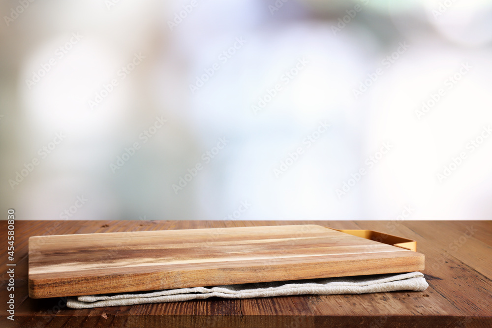 empty table board and defocused indoor background. product display concept