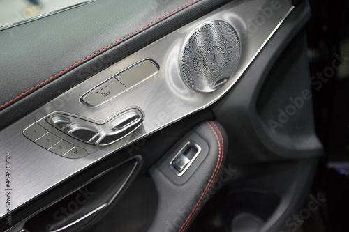 Close up of buttons for adjusting seat position of new modern car.