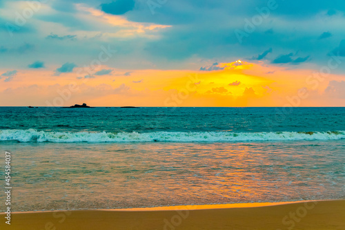 Beautiful colorful sunset landscape panorama from Bentota Beach Sri Lanka.