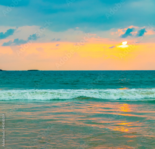 Beautiful colorful sunset landscape panorama from Bentota Beach Sri Lanka.