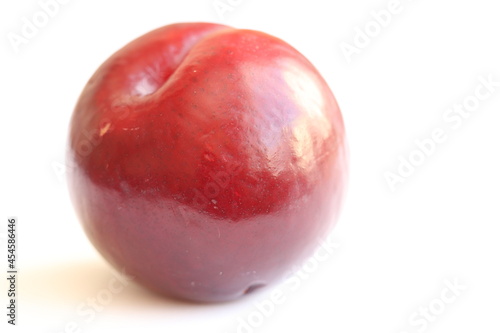 Large plum berry. Plum is a genus of plants in the Pink family. 