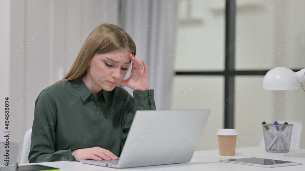 Young Woman with Laptop having Loss, Failure Young Woman with Laptop having Loss, Failure