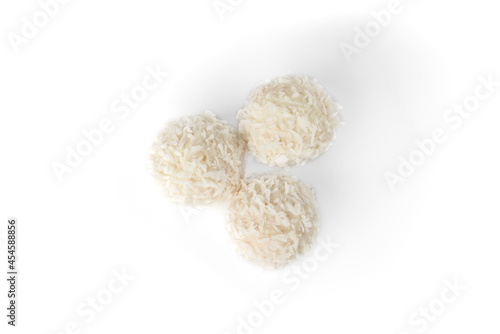 Candy with coconut and white chocolate isolated on white background.
