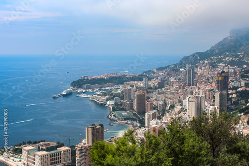 Panoramic view of Monaco city with houses and yachts