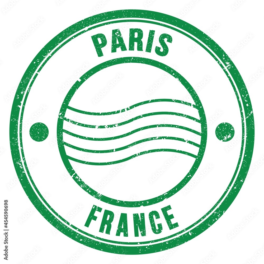 PARIS - FRANCE, words written on green postal stamp PARIS - FRANCE, words written on green postal stamp