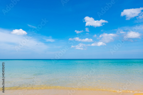 Fototapeta Naklejka Na Ścianę i Meble -  Phuket Thailand beach sea. Landscape view of beach sea and sand in summer sun. Beach space area background. At Patong beach, Phuket, Thailand. On 28 July 2021.