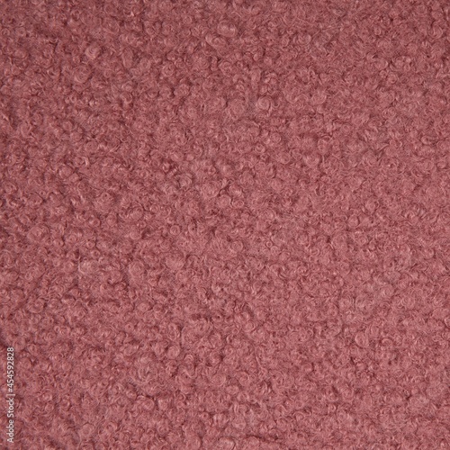 Curly knit boucle fabric texture in dusty pink