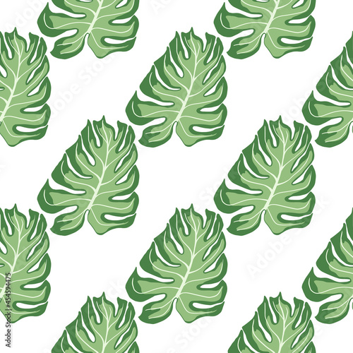 Isolated seamless pattern with green monstera leaf silhouettes print. White background.