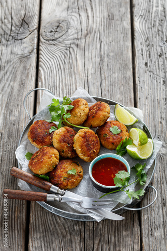 Tod man pla  thai fish cakes on a plate