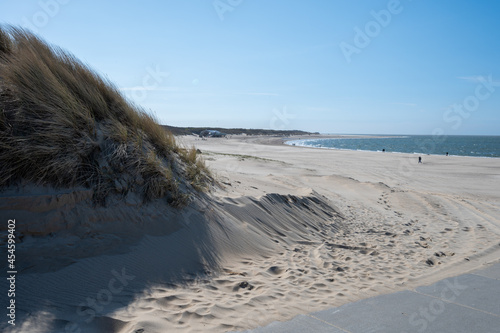 View on wide white sandy North sea beach in Renesse, Zeeland, Netherlands