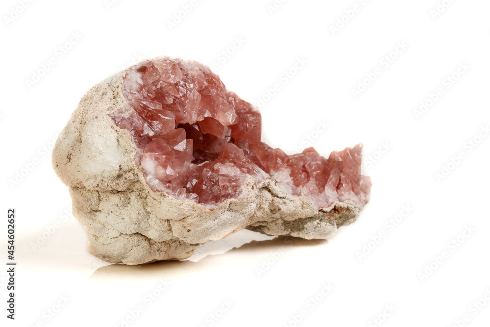 Macro mineral stone Pink Amethyst on a white background Macro mineral stone Pink Amethyst on a white background