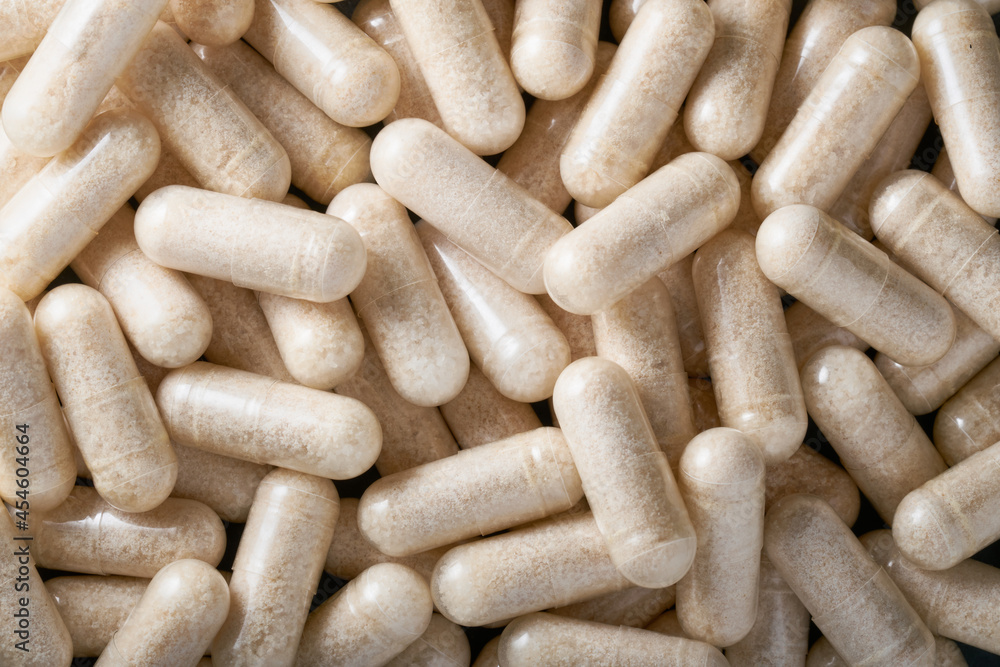 Background of white psyllium capsule pills Background of white psyllium capsule pills
