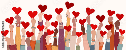 Group of raised arms and hands. Diverse people holding a heart. Charitable donation and volunteer work. Support and assistance. Multicultural and multiethnic community.Diversity of people