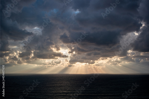 cloud after a thunderstorm, sun rays through the clouds