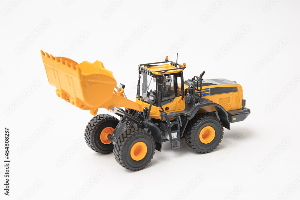Highly detailed yellow single-bucket forklift, scale model of specialized equipment on white background, bulk loader.