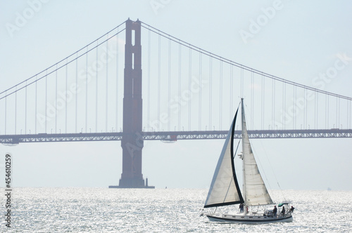 Sailboat crossing the San Francisco Bay, with the Golden Gate Bridge in the background